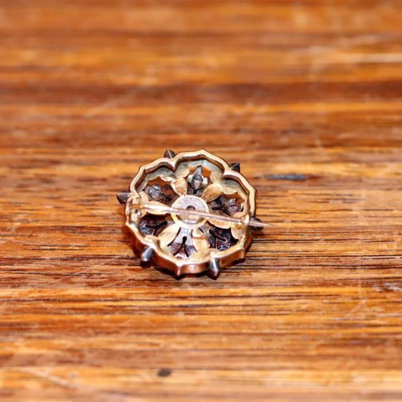 Dos broche ronde or rose XIXe