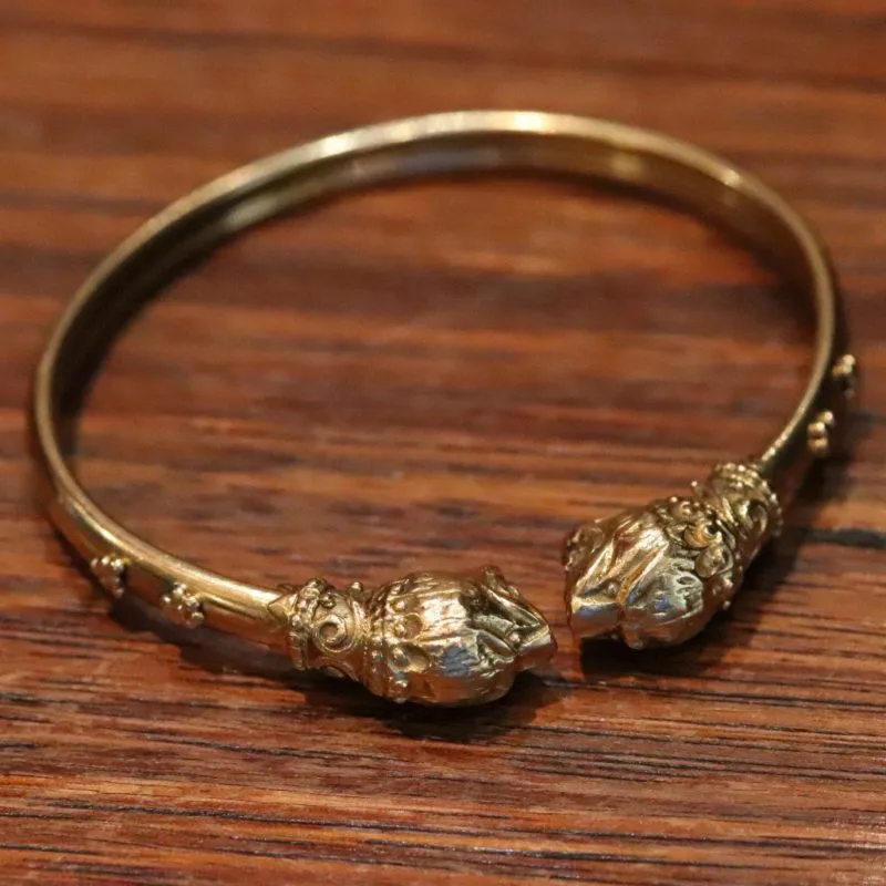 Bracelet or têtes de lions signé Zolotas