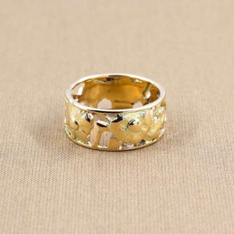 Bague jonc ajouré en or motifs floraux