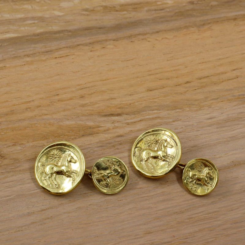 Boutons de manchette or