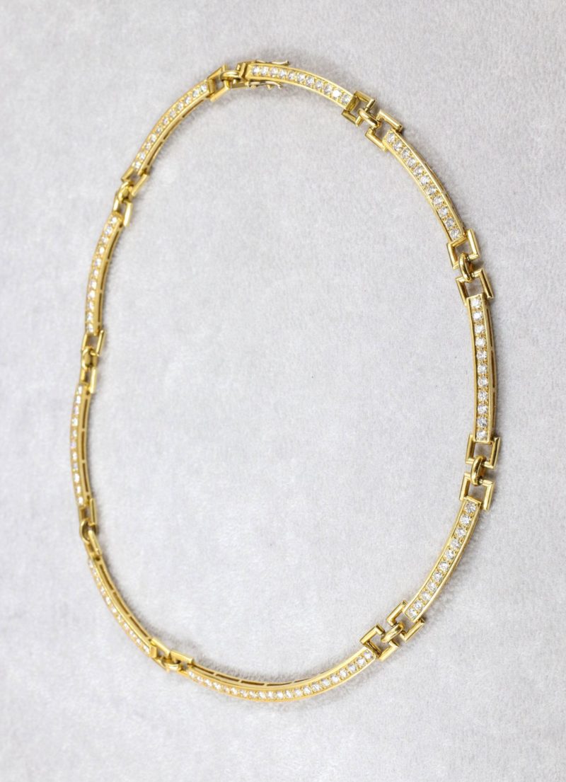 Collier rigide articulé or et diamants