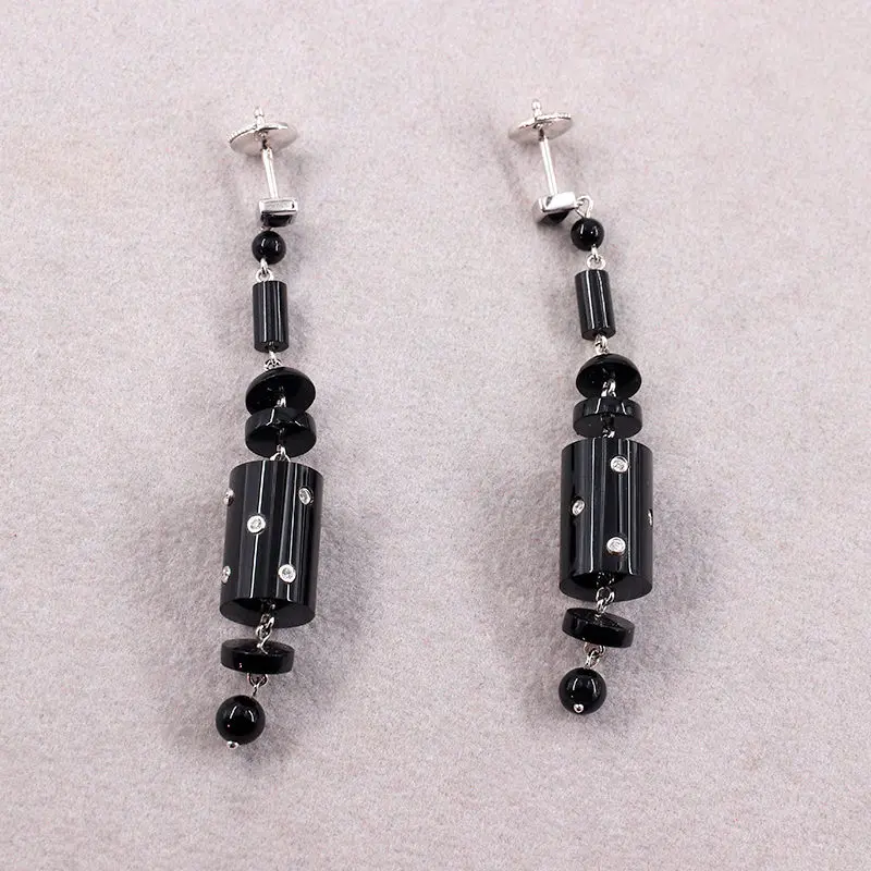 Boucles d'oreilles pendantes onyx et diamants