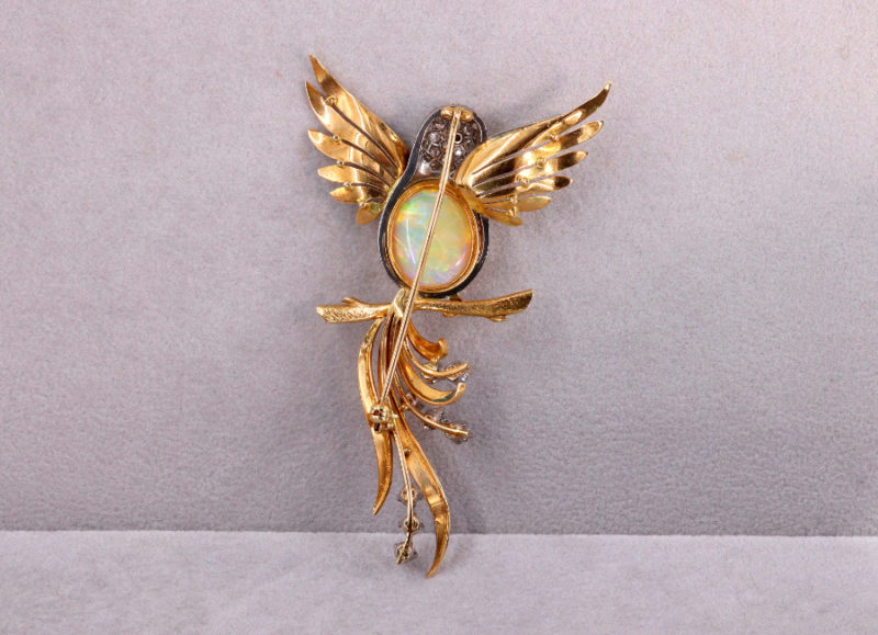 Grande broche oiseau déployé opale et diamants