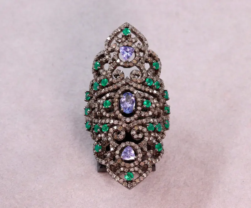 Bague argent noirci tanzanites, émeraudes et diamants