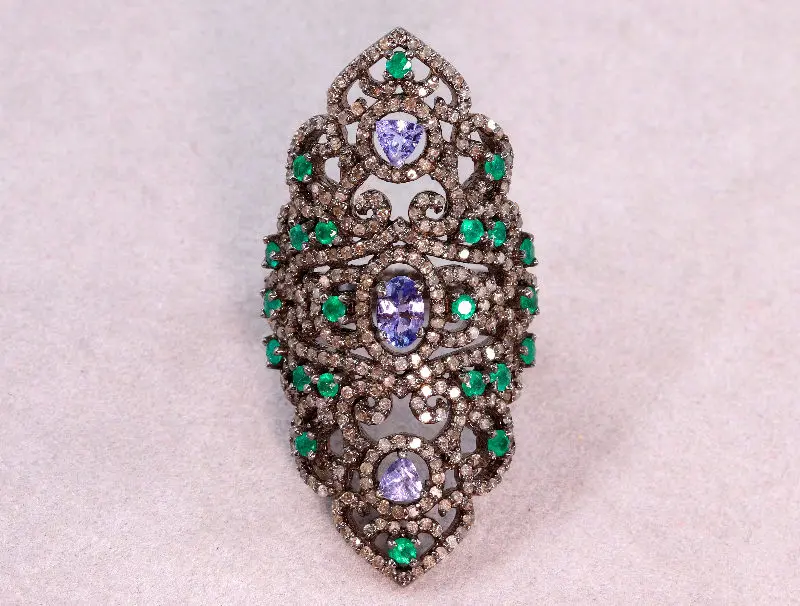 Bague argent noirci tanzanites, émeraudes et diamants