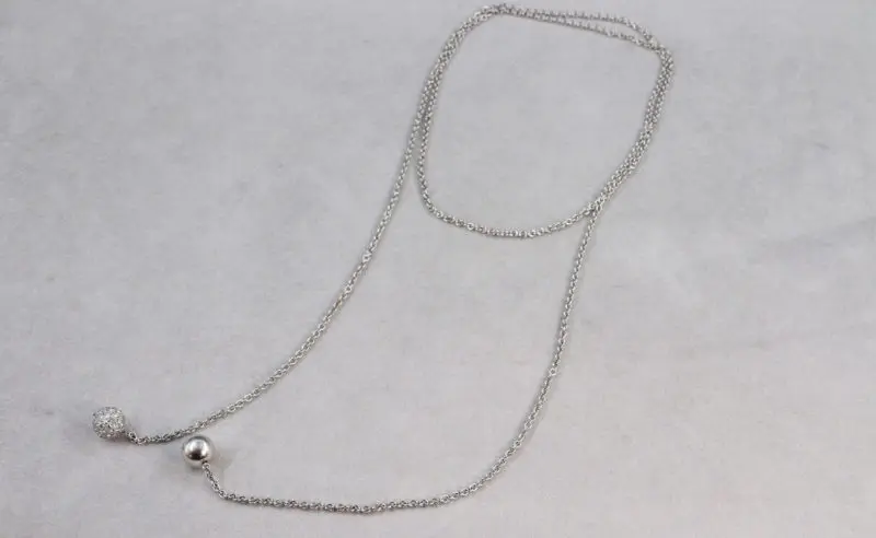 collier long Bulgari boules d'or blanc et diamants