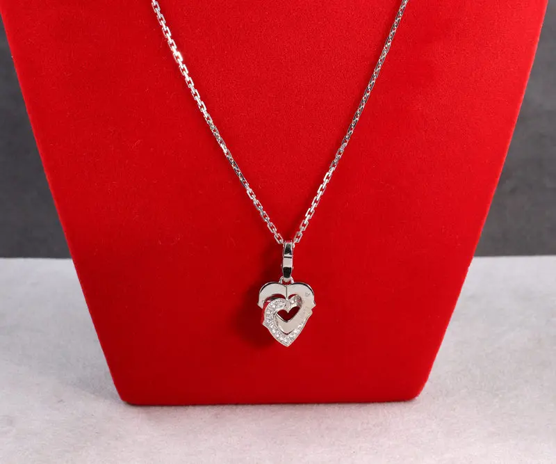 Pendentif double coeur Cartier