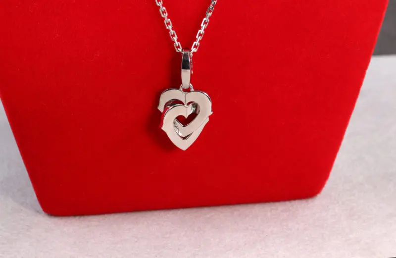 Pendentif double coeur Cartier