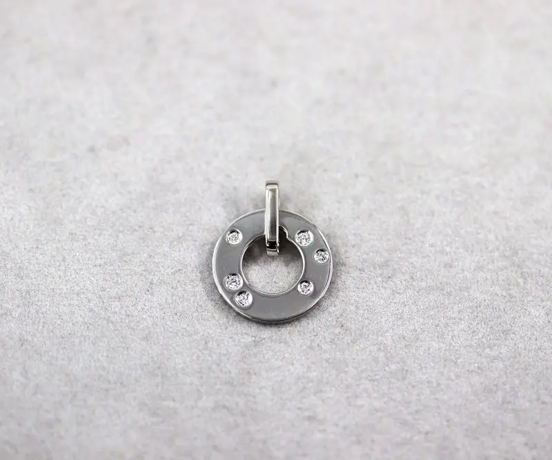 Pendentif vintage Dinh Van or blanc diamants