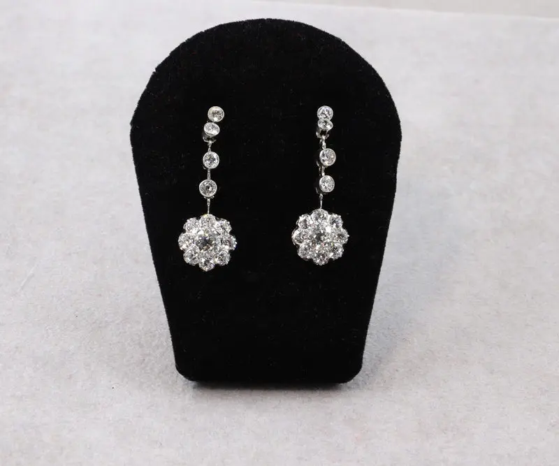Boucles d'oreilles pendantes marguerites diamants