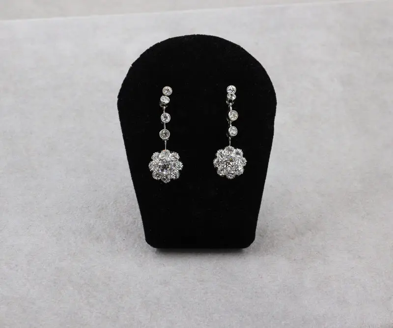 Boucles d'oreilles pendantes marguerites diamants