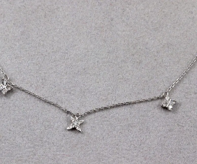 Collier collerette or blanc et diamants