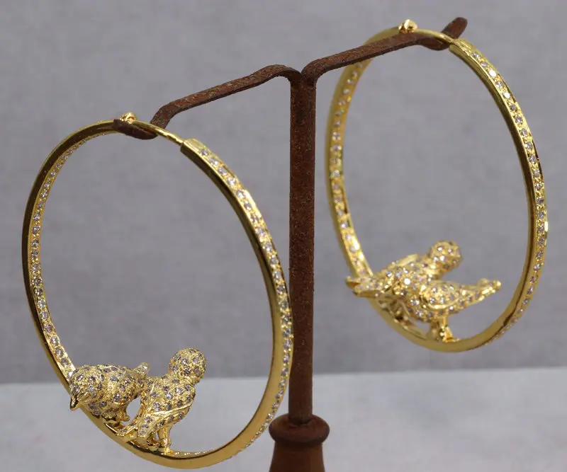 Boucles d'oreilles créoles oiseaux perchés or et diamants