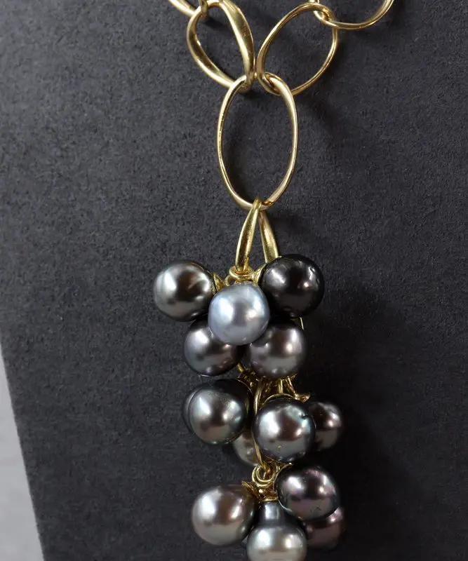 Grande chaîne en or et son pendentif en perles de Tahiti