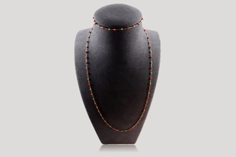 Ensemble collier et bracelet boules d'or et boules émail orange