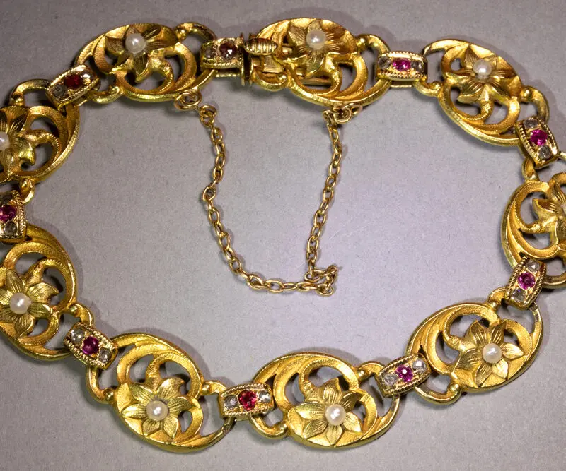 Bracelet Art Nouveau or perles et pierres rouges