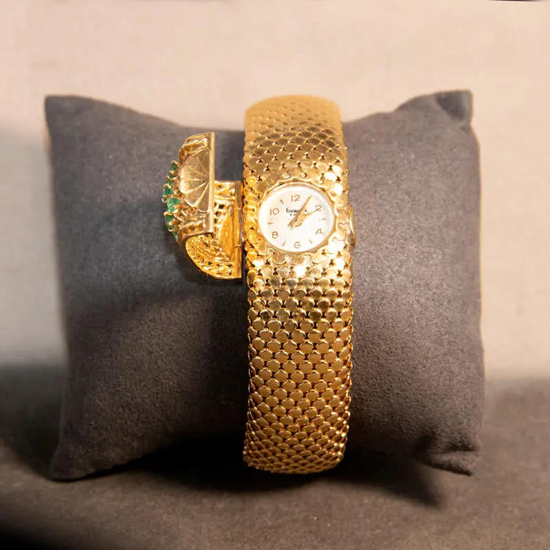 Montre à capot émeraudes