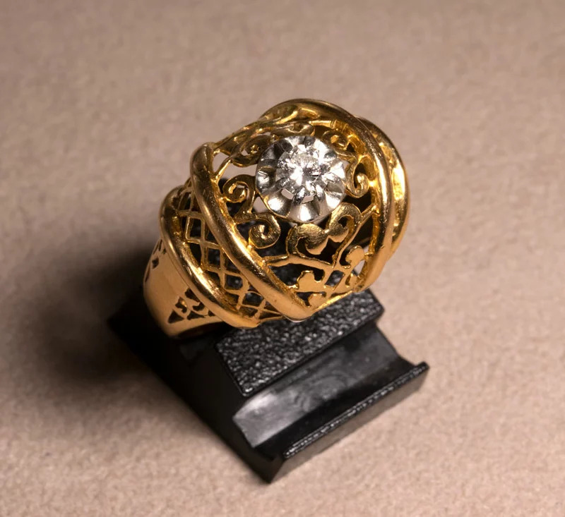 Bague 1950 ajourée diamant central